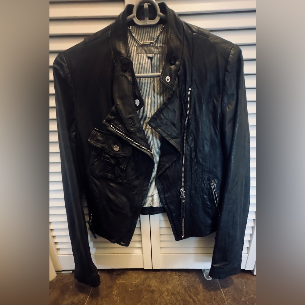 Black Leather Jacket with Zipper Details